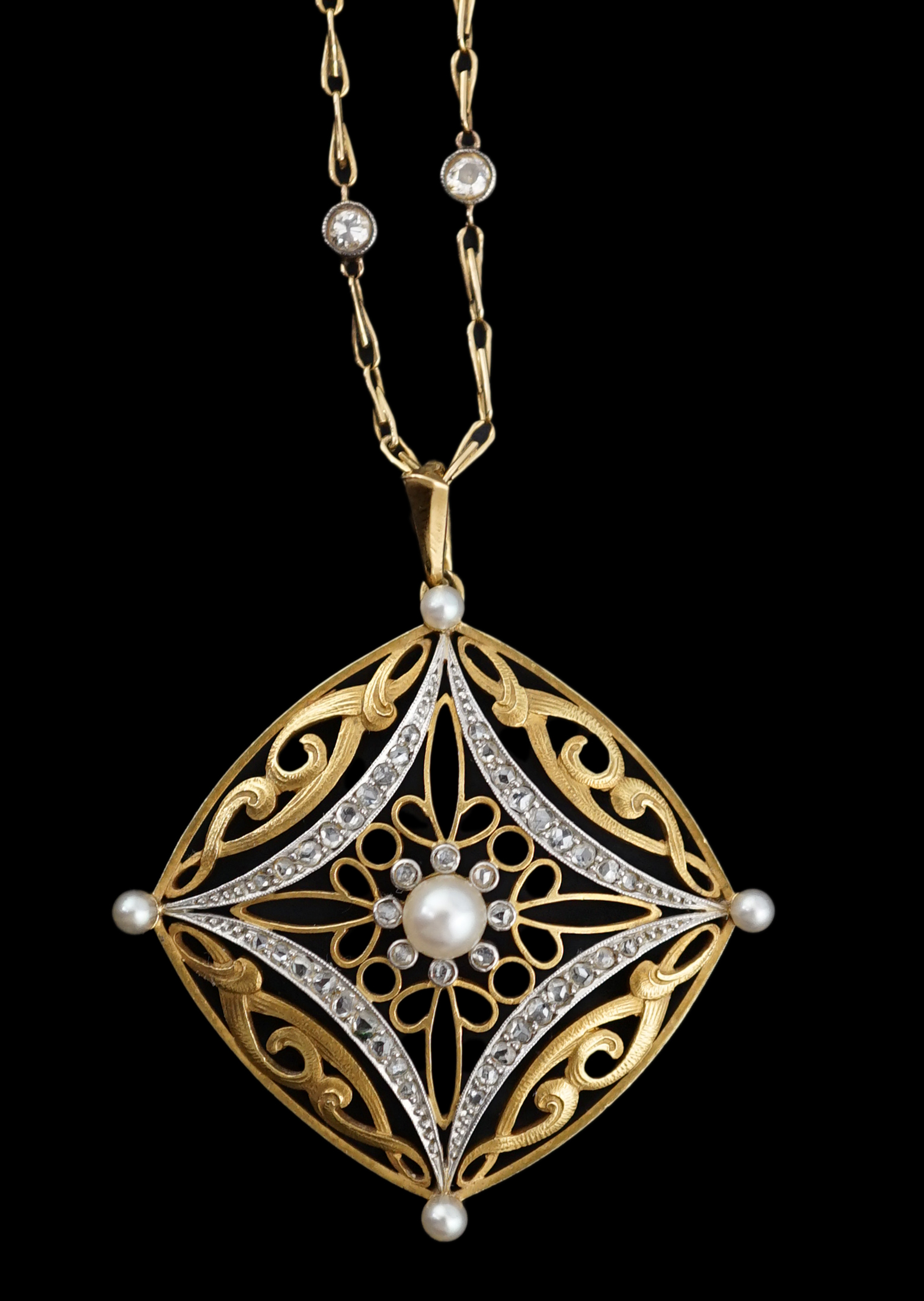 A French Belle Epoque pierced 18k gold, seed pearl and rose cut diamond set pendant, on a French 18k gold and diamond set spectacle necklace
